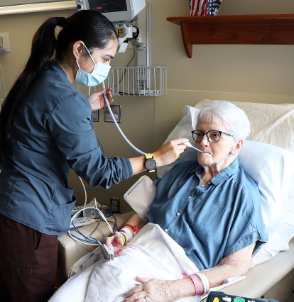 Nurse with geriatric patient