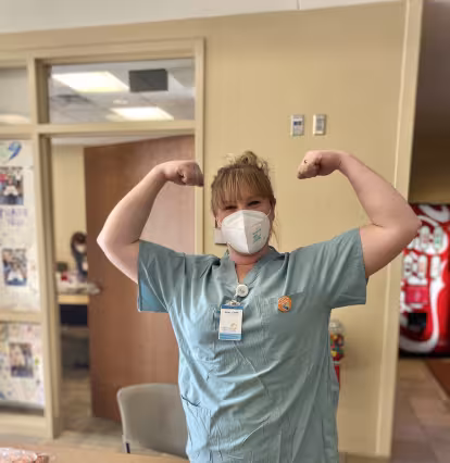 female nurse in strong pose