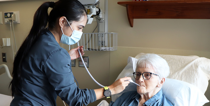 Nurse with geriatric patient