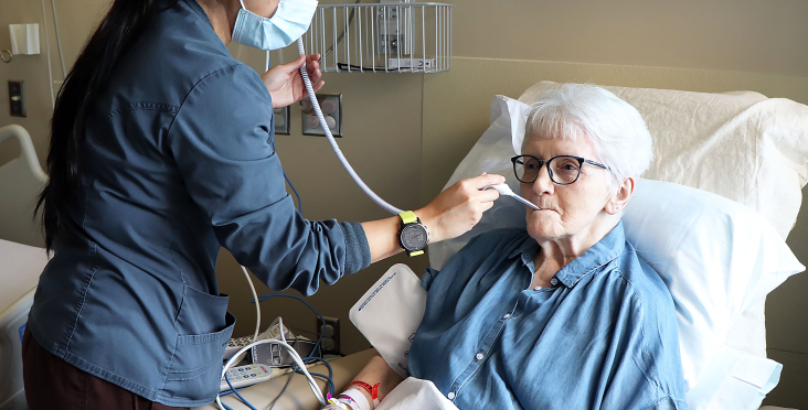 Nurse with geriatric patient
